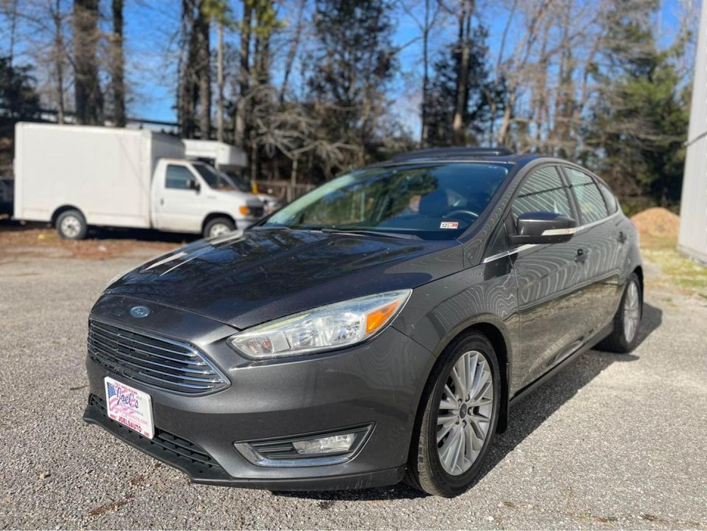 2015 Grey /Black Ford Focus Titanium (1FADP3N26FL) with an 2.0 4 CYL engine, Auto transmission, located at 5700 Curlew Drive, Norfolk, VA, 23502, (757) 455-6330, 36.841885, -76.209412 - Photo#0